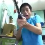 Dude gets scared and shoots the TV screen